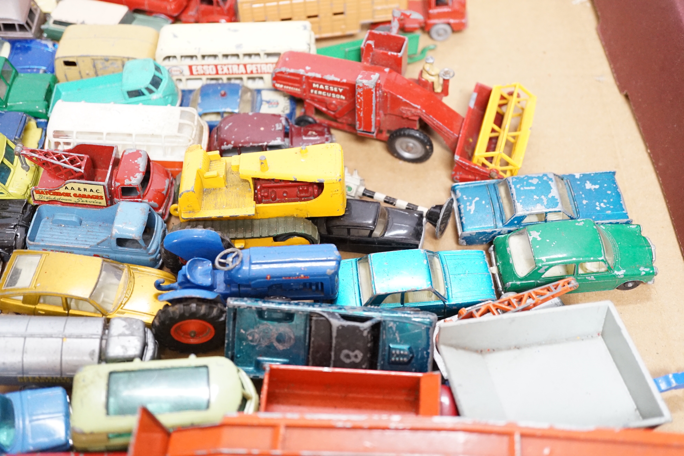 A collection of diecast vehicles by Corgi Toys, Dinky, Spot-On, Matchbox, etc. including 38, corgi toys; a Batmobile, a gold James Bond Aston Martin, a Man From UNCLE Oldsmobile, etc. 18 Husky Toys, ten Dinky Toys, etc.